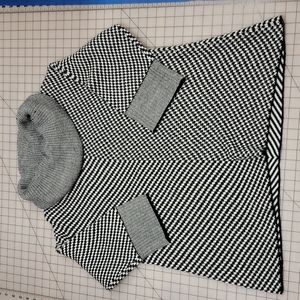 3/4 Sleeve black and white cowl neck sweater. Size large.
